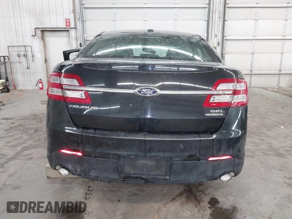 2015 Ford Taurus SEL with VIN 1FAHP2E81FG181897, listed as a IAAI auction lot 41598004 with Not Provided miles and . Bid and sale history available at carsss.com. Image 17.