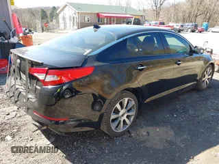 2013 Kia Optima SX with VIN 5XXGR4A65DG186542, listed as a IAAI auction lot 41824914 with 205,582 mi miles and . Bid and sale history available at DreamBid. Image 4.