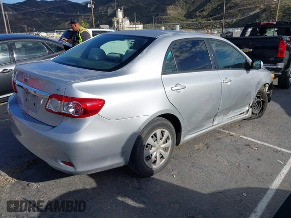 2011 Toyota Corolla L with VIN JTDBU4EE7BJ108265, listed as a IAAI auction lot 41969221 with 104,273 mi miles. Bid and sale history available at carsss.com. Image 4.