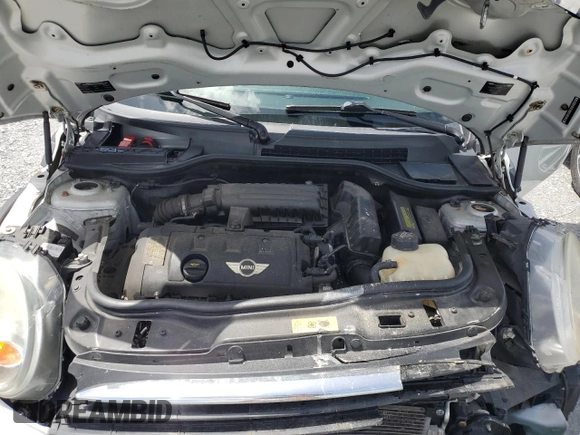 2012 MINI Hardtop with VIN WMWSU3C54CT186406, listed as a Copart auction lot 60940305 with 106,819 mi miles and Salvage title. Bid and sale history available at DreamBid. Image 12.