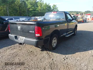 2014 Ram 1500 Tradesman z VIN 3C6JR7DG4EG324833, wystawiony jako IAAI lot #42876061 z przebiegiem 125 285 mil mil oraz . Historia ofert i sprzedaży dostępna na DreamBid. Obrazek 4.