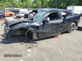 2015 Dodge Charger SXT with VIN 2C3CDXHG5FH852509, listed as a Copart auction lot 58958855 with Not provided miles and Salvage title. Bid and sale history available at DreamBid. Image 1.