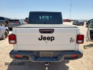 2023 Jeep Gladiator Sport S with VIN 1C6HJTAG4PL564716, listed as a Copart auction lot 57489125 with 20,971 mi miles and Salvage title. Bid and sale history available at DreamBid. Image 6.