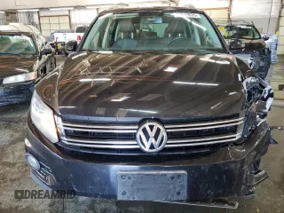 2013 Volkswagen Tiguan SE z VIN WVGBV7AX9DW529234, wystawiony jako Copart lot #41610635 z przebiegiem 130 566 mil mil oraz Szkoda całkowita • Salvage title. Historia ofert i sprzedaży dostępna na DreamBid. Obrazek 5.