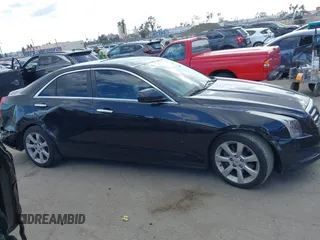 2013 Cadillac ATS z VIN 1G6AA5RX9D0167867, wystawiony jako IAAI lot #41945699 z przebiegiem 166 040 mil mil oraz . Historia ofert i sprzedaży dostępna na DreamBid. Obrazek 13.