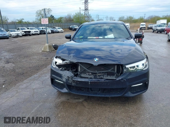 2018 BMW 5 Series 540i xDrive with VIN WBAJE7C58JWD49881, listed as a IAAI auction lot 42091065 with 73,542 mi miles and . Bid and sale history available at DreamBid. Image 12.