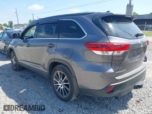 2018 Toyota Highlander SE with VIN 5TDJZRFH1JS895847, listed as a IAAI auction lot 42667973 with 93,876 mi miles and . Bid and sale history available at DreamBid. Image 3.