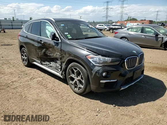 2018 BMW X1 xDrive28i with VIN WBXHT3C38J5K28174, listed as a Copart auction lot 57333385 with 50,064 mi miles and Salvage title. Bid and sale history available at DreamBid. Image 13.