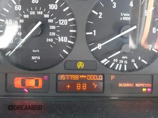 2000 BMW 5 Series 528iA with VIN WBADM6344YGU26491, listed as a IAAI auction lot 40301317 with 157,798 mi miles. Bid and sale history available at carsss.com. Image 7.
