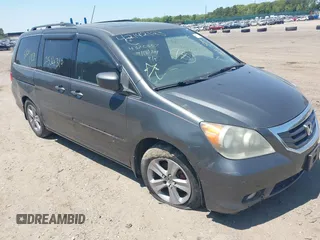 2010 Honda Odyssey Touring с VIN 5FNRL3H90AB085105, выставлен на аукционе IAAI как лот 42142123 с пробегом Не указан миль и . История ставок и продаж доступна на DreamBid. Изображение 1.