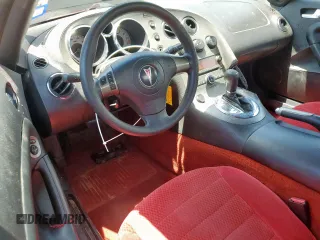 2006 Pontiac Solstice z VIN 1G2MB35B36Y116766, wystawiony jako Copart lot #57482765 z przebiegiem 173 564 mil mil oraz Szkoda całkowita • Salvage title. Historia ofert i sprzedaży dostępna na DreamBid. Obrazek 8.