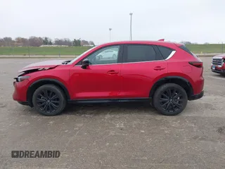 2022 Mazda CX-5 2.5 Turbo with VIN JM3KFBAY3N0622971, listed as a IAAI auction lot 40957512 with 25,084 mi miles and . Bid and sale history available at carsss.com. Image 14.