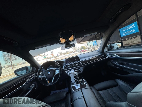 2017 BMW 7 Series 750i с VIN WBA7F0C31HGM21647, выставлен на аукционе Copart как лот 48763345 с пробегом 27 590 миль миль и Чистый • Clean title. История ставок и продаж доступна на DreamBid. Изображение 9.