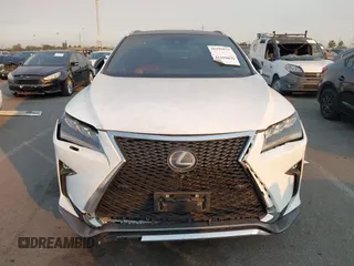 2019 Lexus RX with VIN 2T2BGMCAXKC036573, listed as a IAAI auction lot 41299079 with 104,568 mi miles. Bid and sale history available at carsss.com. Image 12.