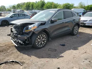 2020 Ford Escape Titanium с VIN 1FMCU9J99LUC63261, выставлен на аукционе Copart как лот 56312955 с пробегом Не указан миль и Списание • Salvage title. История ставок и продаж доступна на DreamBid. Изображение 1.