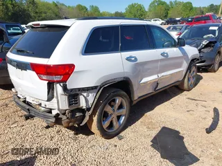 2013 Jeep Grand Cherokee Limited with VIN 1C4RJEBG7DC546133, listed as a IAAI auction lot 41970941 with 146,077 mi miles. Bid and sale history available at carsss.com. Image 4.