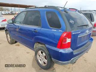 2009 Kia Sportage LX with VIN KNDJF723X97613377, listed as a IAAI auction lot 41454472 with 167,790 mi miles. Bid and sale history available at carsss.com. Image 3.