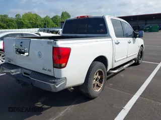 2004 Nissan Titan LE with VIN 1N6AA07A34N517511, listed as a IAAI auction lot 42250560 with 122,189 mi miles and . Bid and sale history available at DreamBid. Image 4.