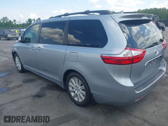 2015 Toyota Sienna XLE with VIN 5TDYK3DC5FS685735, listed as a IAAI auction lot 42139229 with 87,694 mi miles and . Bid and sale history available at DreamBid. Image 3.