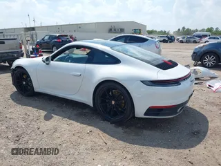 2022 Porsche 911 Carrera with VIN WP0AA2A91NS206000, listed as a IAAI auction lot 40382242 with 26,394 mi miles. Bid and sale history available at carsss.com. Image 3.
