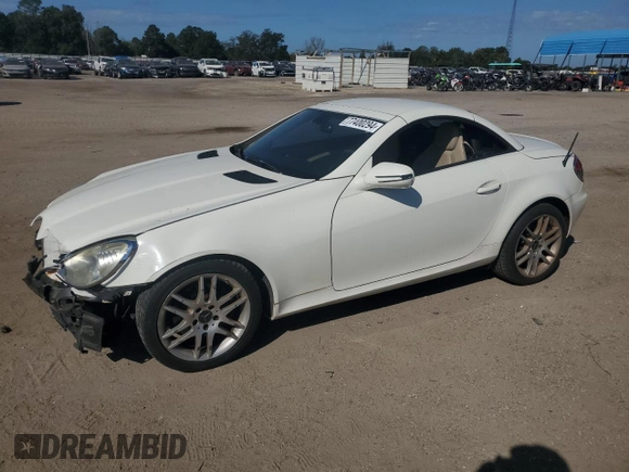 2009 Mercedes-Benz SLK-Class 3.0L with VIN WDBWK54F79F209339, listed as a Copart auction lot 77400294 with 68,540 mi miles and Salvage Title. Bid and sale history available at carsss.com. Image 1.