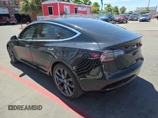 2018 Tesla Model 3 Long Range Battery z VIN 5YJ3E1EB8JF070461, wystawiony jako Copart lot #58379905 z przebiegiem 49 178 mil mil oraz Tytuł czysty. Historia ofert i sprzedaży dostępna na DreamBid. Obrazek 3.