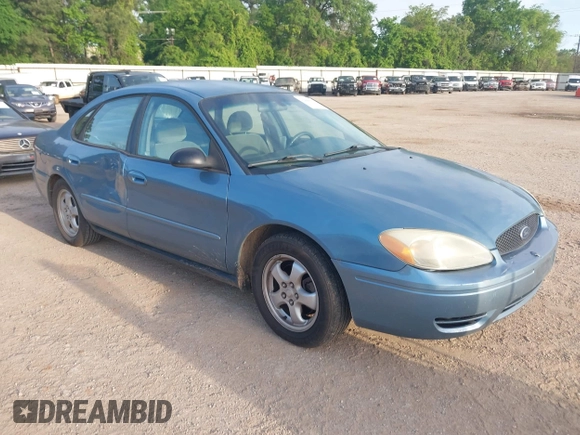 2006 Ford Taurus SE with VIN 1FAFP53U26A179541, listed as a IAAI auction lot 42000612 with 214,881 mi miles. Bid and sale history available at carsss.com. Image 1.