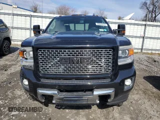 2015 GMC Sierra 2500HD available WiFi Denali with VIN 1GT120E86FF581670, listed as a Copart auction lot 49244415 with 211,894 mi miles and Salvage Title. Bid and sale history available at carsss.com. Image 5.