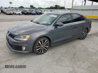 2014 Volkswagen Jetta GLI z VIN 3VW4T7AJ5EM232071, wystawiony jako Copart lot #60315575 z przebiegiem 120 672 mil mil oraz Czysty tytuł • Clean title. Historia ofert i sprzedaży dostępna na DreamBid. Obrazek 1.