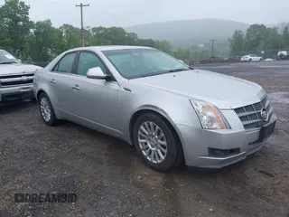 2008 Cadillac CTS AWD z VIN 1G6DG577180182528, wystawiony jako IAAI lot #42329391 z przebiegiem 266 633 mil mil oraz . Historia ofert i sprzedaży dostępna na DreamBid. Obrazek 1.