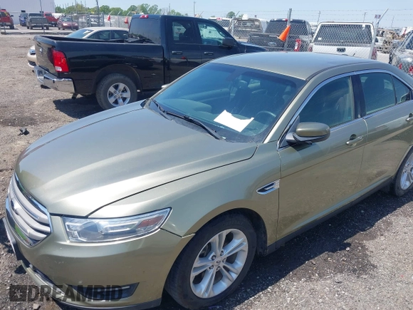 2013 Ford Taurus SEL with VIN 1FAHP2E88DG105557, listed as a IAAI auction lot 42040773 with 157,705 mi miles and . Bid and sale history available at carsss.com. Image 6.