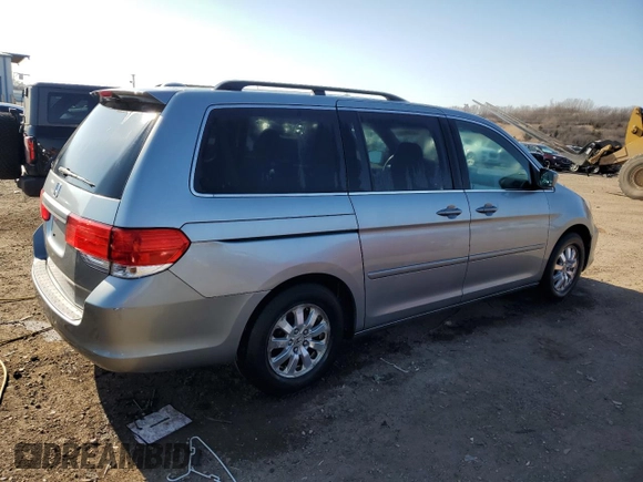 2010 Honda Odyssey EX-L with VIN 5FNRL3H62AB031763, listed as a Copart auction lot 52800055 with 220,450 mi miles and Salvage Title. Bid and sale history available at DreamBid. Image 3.
