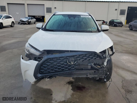 2023 Toyota Corolla Cross LE with VIN 7MUCAAAG4PV047900, listed as a Copart auction lot 85464234 with NaN miles and Salvage Title. Bid and sale history available at carsss.com. Image 5.