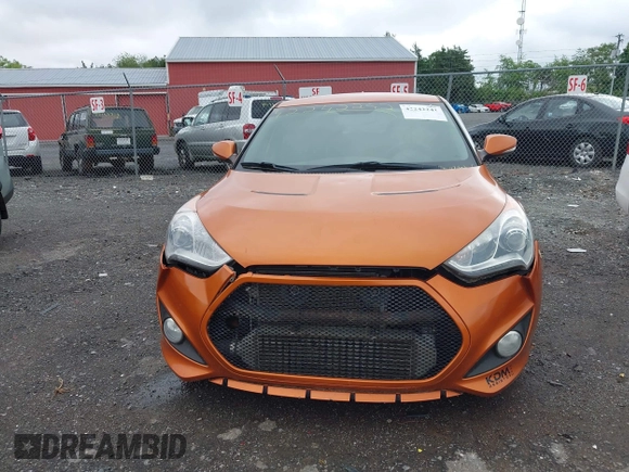2013 Hyundai Veloster Turbo z VIN KMHTC6AE3DU124744, wystawiony jako IAAI lot #42242242 z przebiegiem 115 757 mil mil oraz . Historia ofert i sprzedaży dostępna na DreamBid. Obrazek 6.
