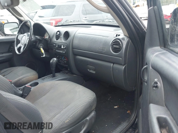 2003 Jeep Liberty Sport with VIN 1J4GK48KX3W656837, listed as a IAAI auction lot 40785615 with 164,450 mi miles and . Bid and sale history available at DreamBid. Image 5.