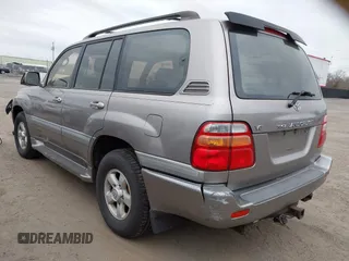 2001 Toyota Land Cruiser with VIN JTEHT05J112010131, listed as a IAAI auction lot 41719396 with 265,944 mi miles. Bid and sale history available at carsss.com. Image 3.