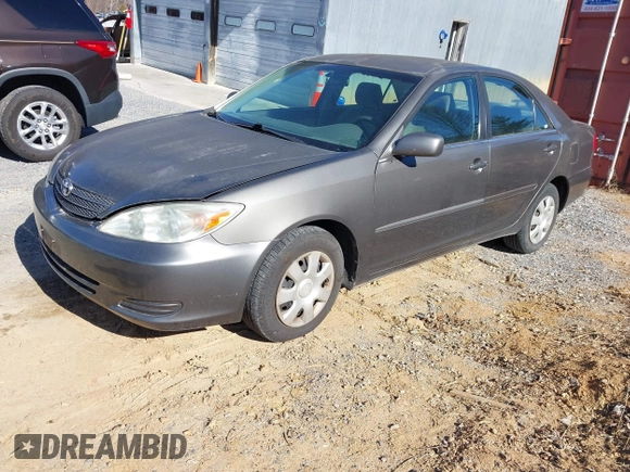 2004 Toyota Camry LE with VIN 4T1BE32K54U904138, listed as a IAAI auction lot 41792208 with 217,829 mi miles and . Bid and sale history available at carsss.com. Image 2.