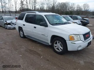 2004 GMC Envoy XUV SLE with VIN 1GKES12S846143483, listed as a IAAI auction lot 41500608 with 242,926 mi miles. Bid and sale history available at carsss.com. Image 1.