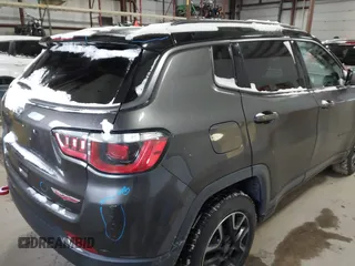 2019 Jeep Compass Trailhawk with VIN 3C4NJDDB2KT649889, listed as a IAAI auction lot 41562599 with 70,700 mi miles and . Bid and sale history available at carsss.com. Image 4.