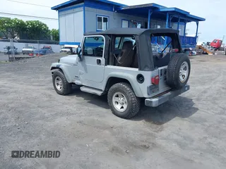 2004 Jeep Wrangler Sport with VIN 1J4FA49S04P781581, listed as a IAAI auction lot 42078693 with 111,123 mi miles and . Bid and sale history available at DreamBid. Image 3.