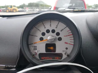 2014 MINI Countryman S z VIN WMWZC5C57EWP38396, wystawiony jako IAAI lot #42400771 z przebiegiem 147 302 mil mil oraz . Historia ofert i sprzedaży dostępna na DreamBid. Obrazek 7.