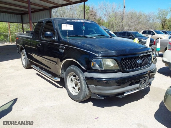 1999 Ford F-150 Work Series with VIN 1FTZX1728XKB68094, listed as a IAAI auction lot 41863108 with 219,109 mi miles. Bid and sale history available at carsss.com. Image 1.