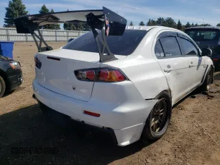 2015 Mitsubishi Lancer Evolution GSR z VIN JA32W8FV3FU022955, wystawiony jako Copart lot #50692924 z przebiegiem 88 882 mil mil oraz . Historia ofert i sprzedaży dostępna na DreamBid. Obrazek 3.
