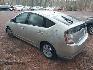 2005 Toyota Prius with VIN JTDKB20U557032555, listed as a IAAI auction lot 40868857 with 236,696 mi miles. Bid and sale history available at carsss.com. Image 3.