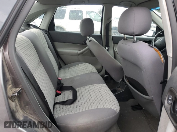2007 Ford Focus S z VIN 1FAHP34N27W144992, wystawiony jako Copart lot #65571385 z przebiegiem 194 933 mil mil oraz Szkoda całkowita • Salvage title. Historia ofert i sprzedaży dostępna na DreamBid. Obrazek 10.