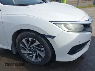 2016 Honda Civic EX with VIN 19XFC2F72GE097060, listed as a IAAI auction lot 41626940 with 156,941 mi miles and . Bid and sale history available at DreamBid. Image 20.