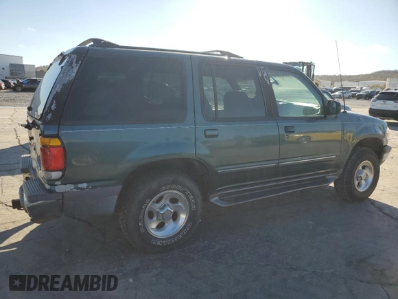 1997 Ford Explorer XL with VIN 1FMDU34E2VZC03015, listed as a Copart auction lot 80654764 with 295,587 mi miles and Salvage title. Bid and sale history available at DreamBid. Image 3.