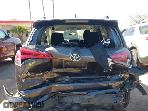 2016 Toyota RAV4 LE with VIN JTMBFREV4GJ052168, listed as a IAAI auction lot 41837564 with 73,659 mi miles. Bid and sale history available at carsss.com. Image 16.