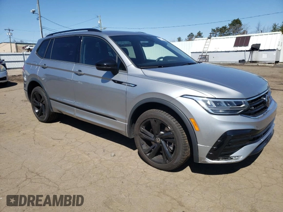 2023 Volkswagen Tiguan SE R-Line Black with VIN 3VV8B7AX3PM090643, listed as a Copart auction lot 52225065 with 60,680 mi miles and Salvage title. Bid and sale history available at DreamBid. Image 4.