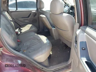 2003 Jeep Grand Cherokee Laredo with VIN 1J4GX48S93C523831, listed as a IAAI auction lot 41852442 with 270,735 mi miles. Bid and sale history available at carsss.com. Image 8.